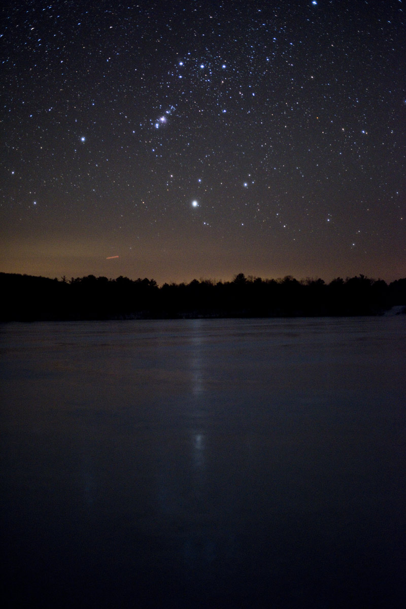 Seeing the light from Orion reflected off lake ice makes one wonder at how far the light has travelled to do that trick just before entering our eyes.s