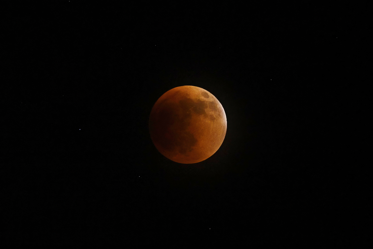 Only light that passes through the earth's atmosphere is now hitting the moon.